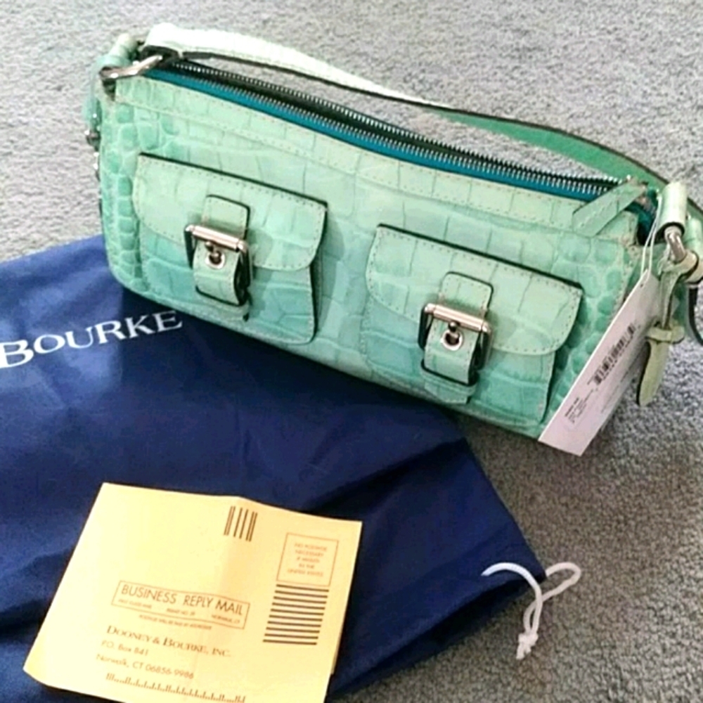 Like new. DOONEY TRADE. Not for sale